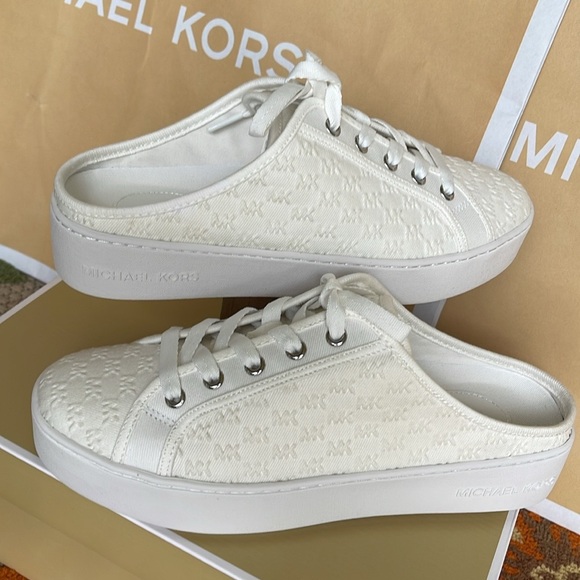 Michael Kors POPPY SLIDE SNEAKERS MK DEBOSSED WASHED DENIM
49T4POFP2D Platforms - Picture 11 of 16